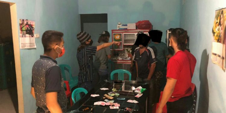 Timsus Waruga Polres Minut Bongkar Praktek Judi Remi dan Biskedo di Watudambo II