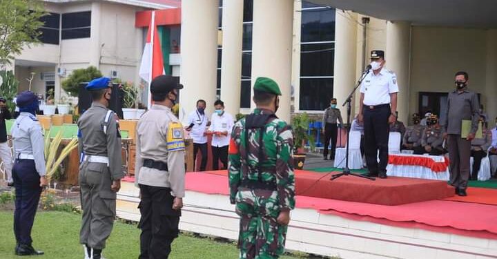 Jelang Lebaran, Bupati Depri Pontoh Pimpin Apel Gelar Pasukan Operasi Ketupat Samrat