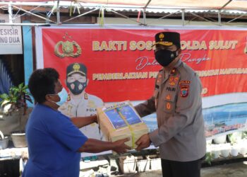 Ribuan Paket Sembako Kembali Disalurkan Polda Sulut dan Jajaran bagi Warga Terdampak Pandemi Covid-19