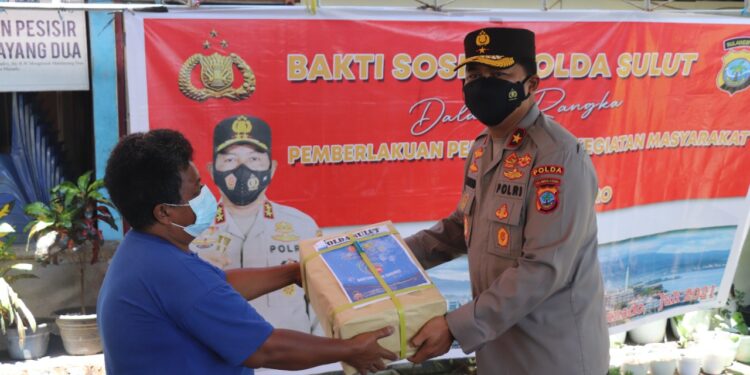 Ribuan Paket Sembako Kembali Disalurkan Polda Sulut dan Jajaran bagi Warga Terdampak Pandemi Covid-19