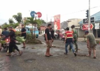 Tanggapi Protes Warga, Dinas PUPR Kotamobagu Lakukan Koordinasi Dengan Balai Jalan Wilayah Sulut