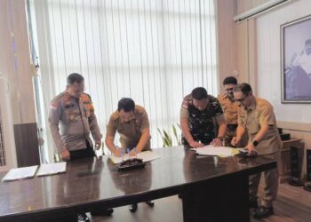 Sekda Tandatangani NHPD Bersama KPU, Bawaslu dan Forkopimda