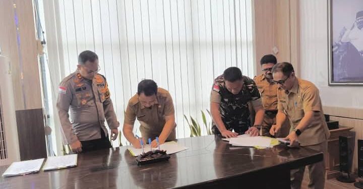 Sekda Tandatangani NHPD Bersama KPU, Bawaslu dan Forkopimda